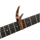 Ortega TWCAPO-WND Gitár capo, ívelt/lapos